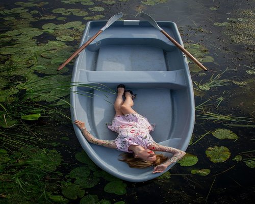 Woman practicing deep breathing outdoors in a scenic natural environment